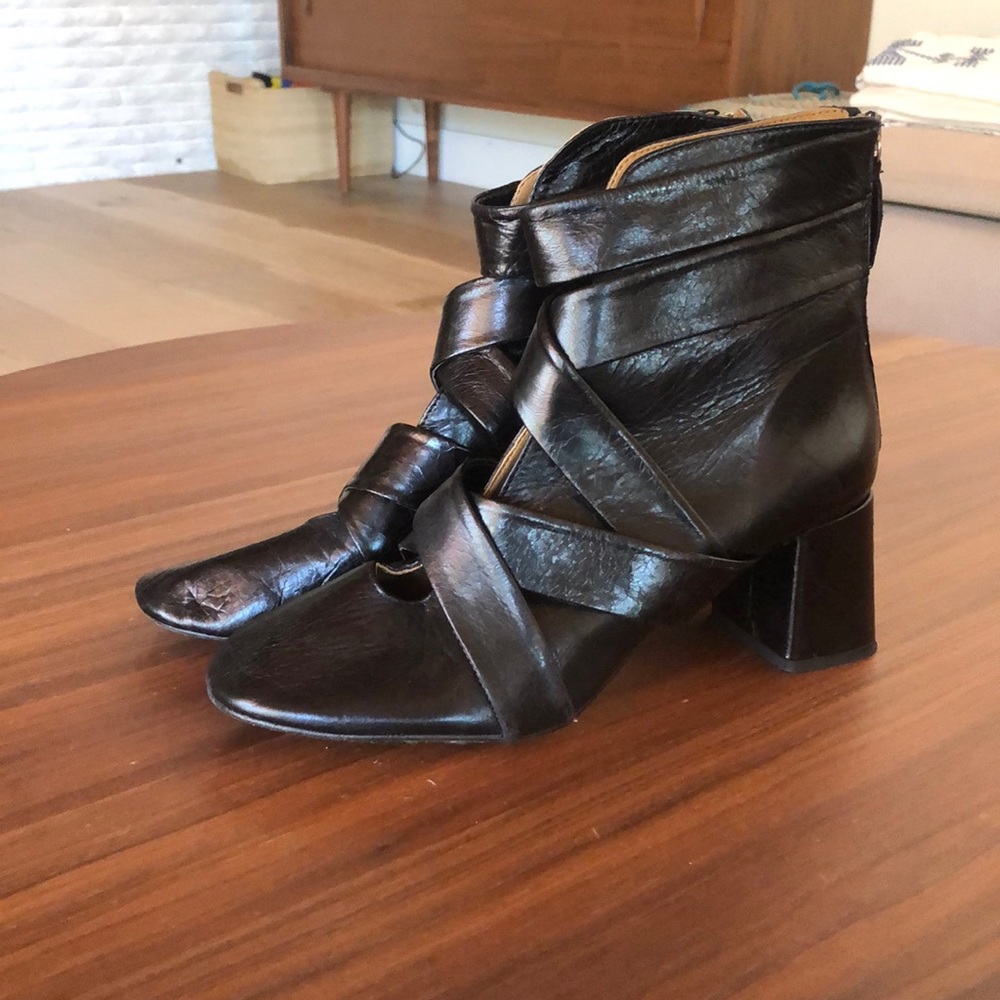 Black leather strap oh booties by Zara